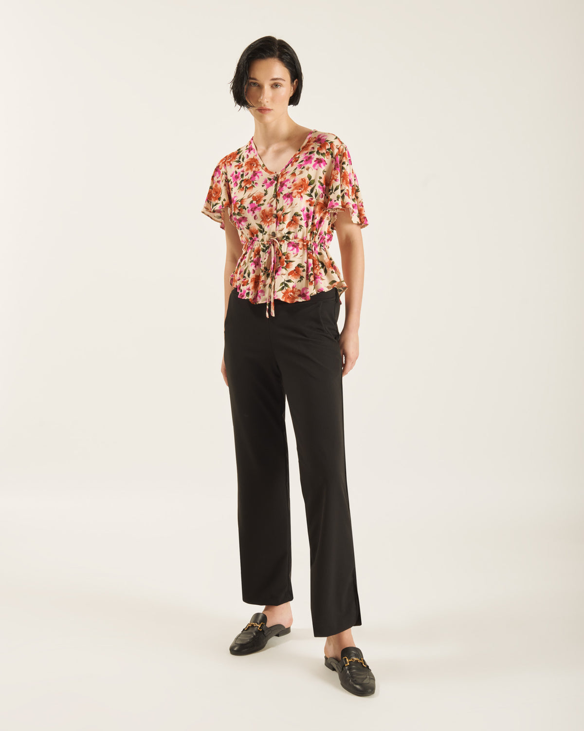 Blusa estampada peplum LAURA