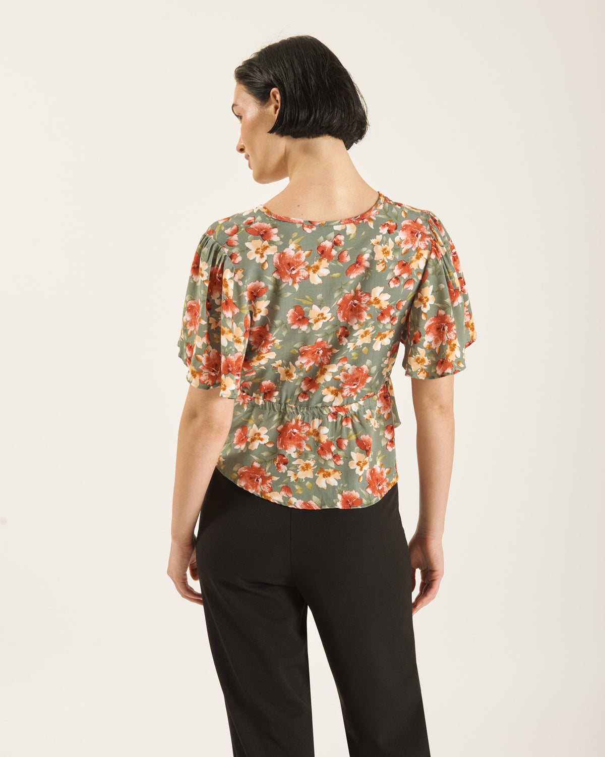Blusa estampada peplum LAURA
