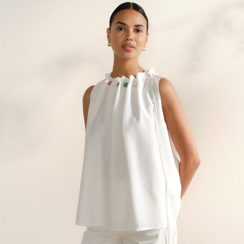 Blusa con cuentas en el cuello Coti