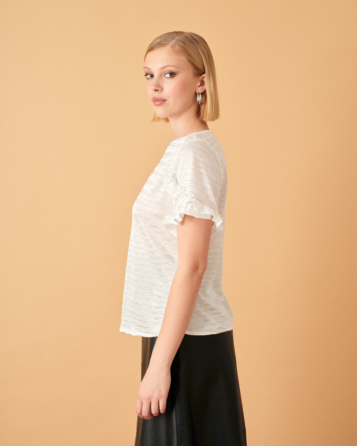 Blusa con olanes en manga Eneida