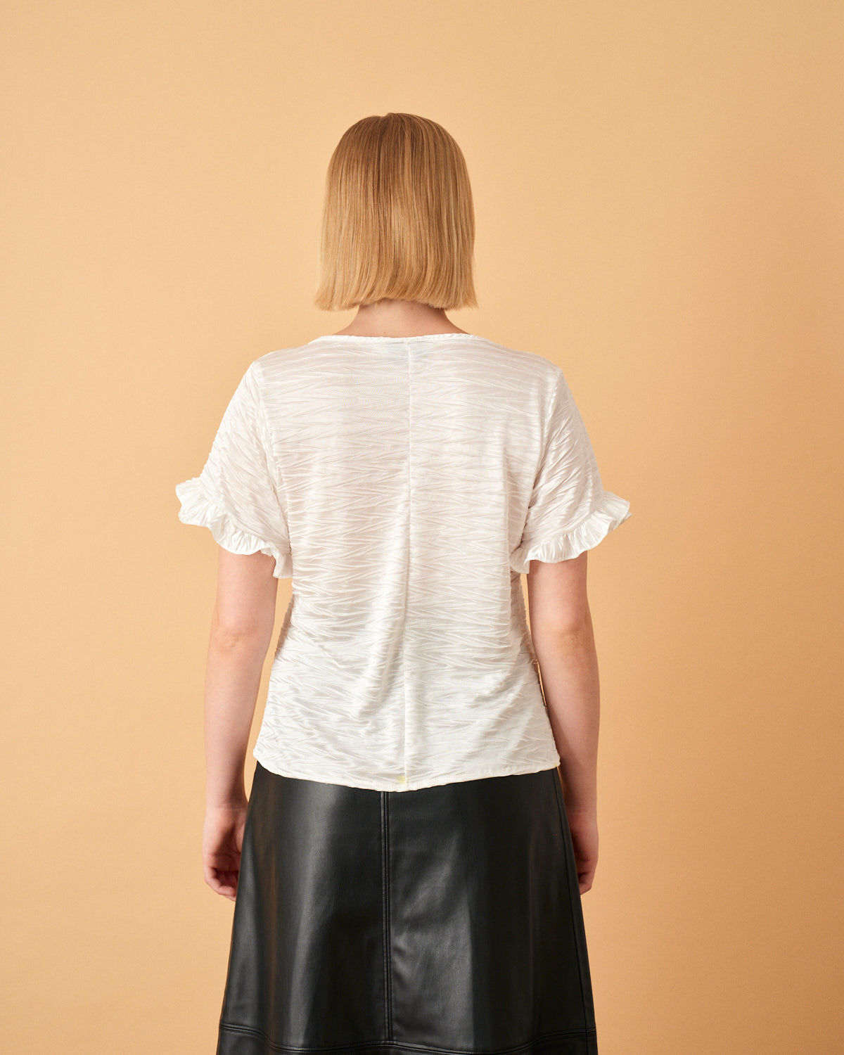 Blusa con olanes en manga Eneida