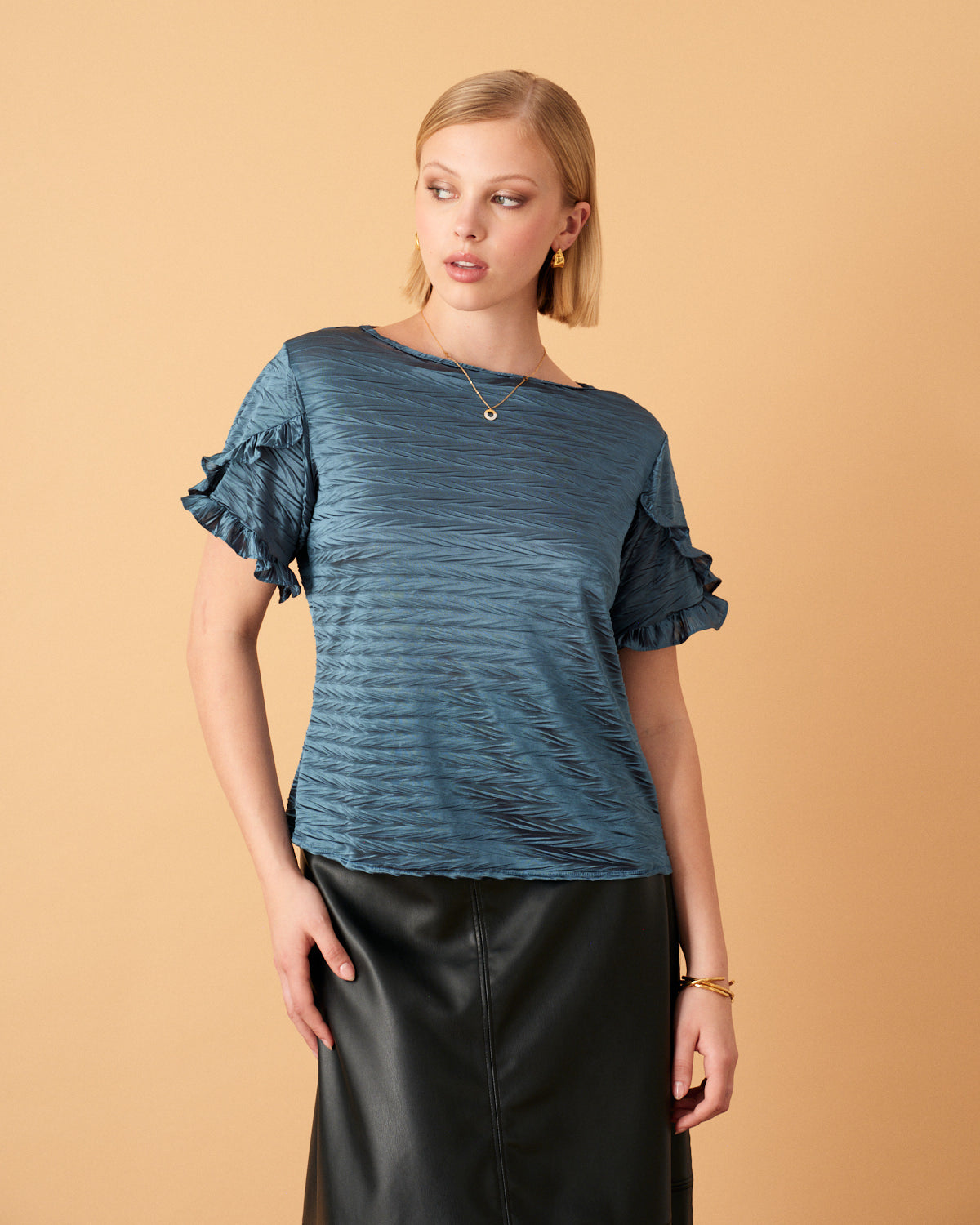 Blusa con olanes en manga Eneida