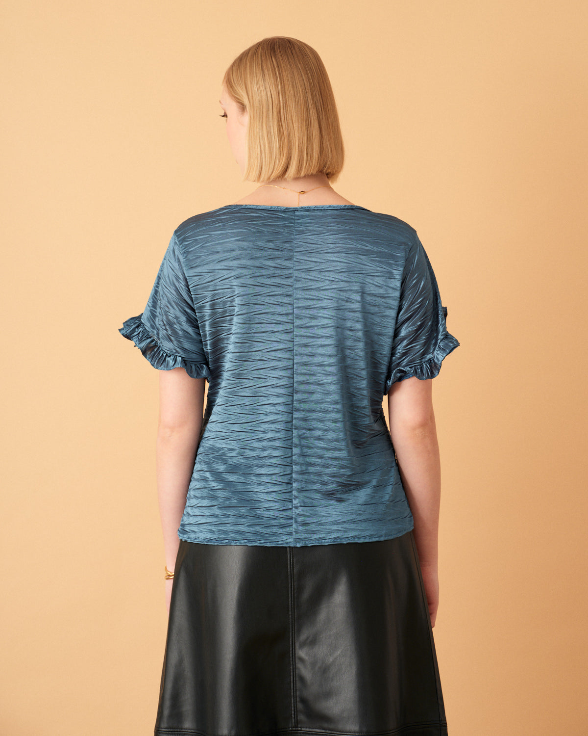 Blusa con olanes en manga Eneida