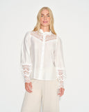 Blusa con tela bordada Manon
