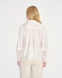 Blusa con tela bordada Manon