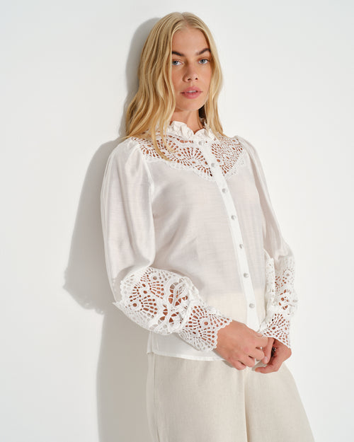 Blusa con tela bordada Manon Hover