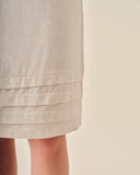 Vestido corto Leonor  con tres tablones en la orilla de bajos